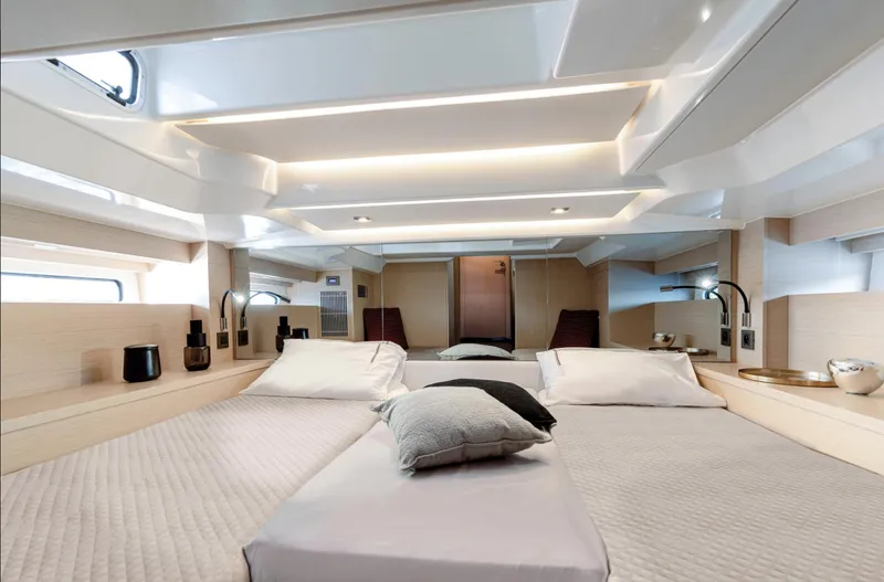 Yacht Photos Pics Luxurious interior cabin of 2025 Jeanneau DB/37 OB yacht with modern design and ambient lighting.