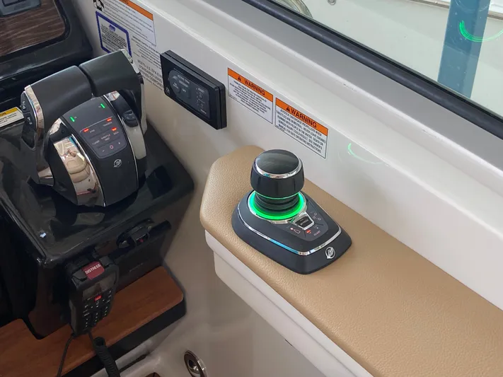  Yacht Photos Pics Control panel of 2018 Sea Ray Sundancer 350 boat with joystick and throttle.