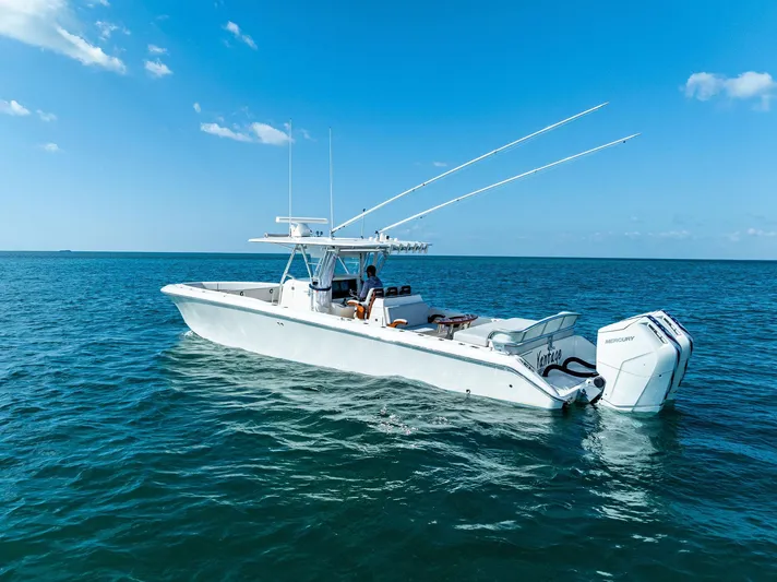 Vantage Yacht Photos Pics 2015 Bahama Center Console boat on open water under clear blue sky.