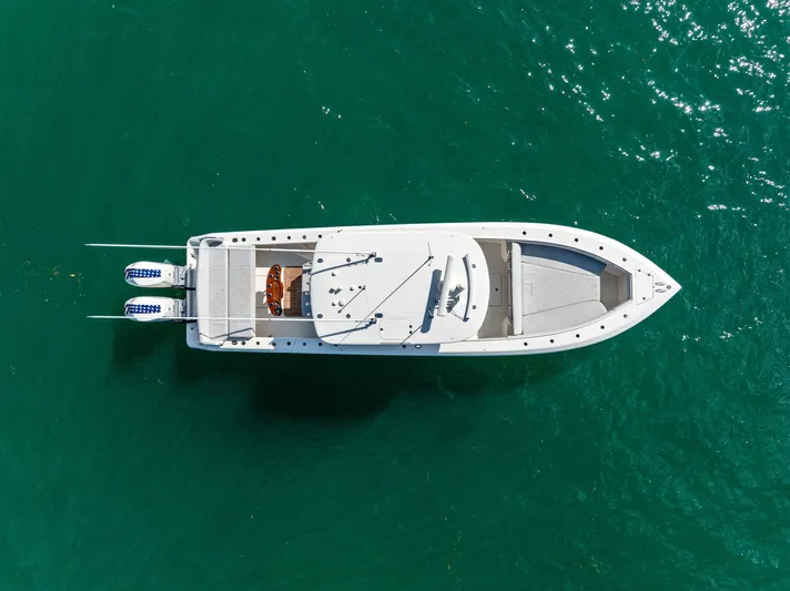 Vantage Yacht Photos Pics Aerial view of 2015 Bahama Center Console boat on turquoise water.