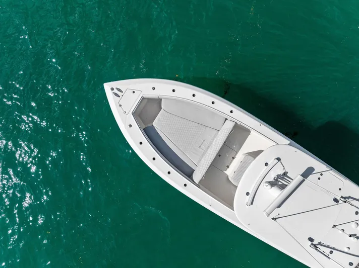 Vantage Yacht Photos Pics Aerial view of 2015 Bahama Center Console boat on turquoise water.