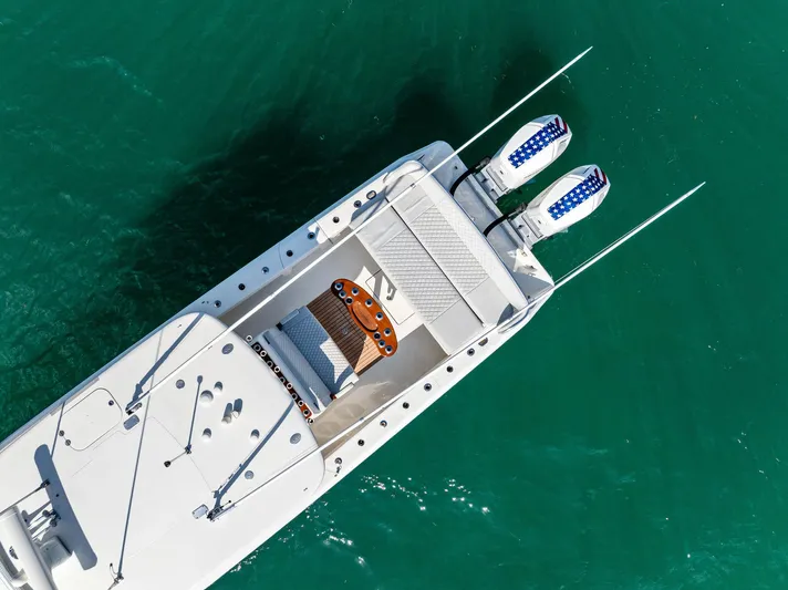 Vantage Yacht Photos Pics Aerial view of 2015 Bahama Center Console boat on turquoise water.