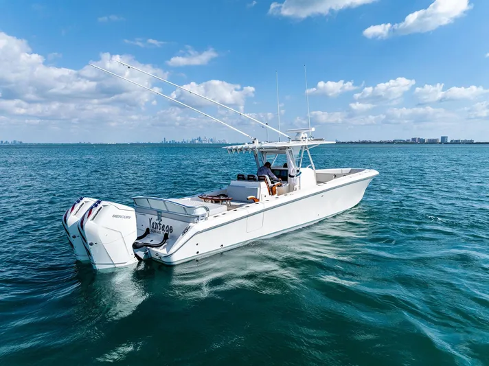 Vantage Yacht Photos Pics 2015 Bahama Center Console boat on open water under blue sky.