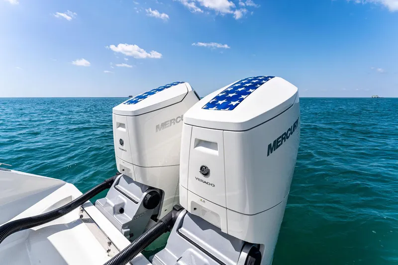 Vantage Yacht Photos Pics Twin Mercury outboard engines on a 2015 Bahama Center Console boat, ocean backdrop.