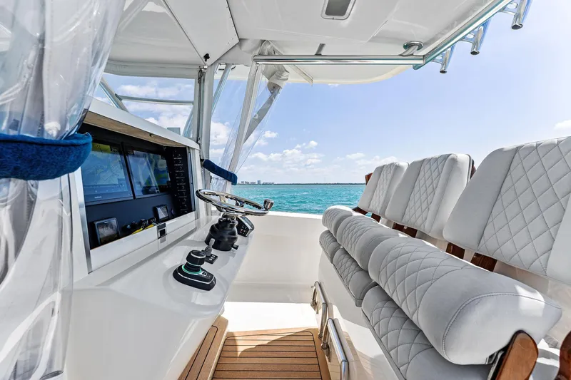 Vantage Yacht Photos Pics 2015 Bahama Center Console boat interior with plush seating and ocean view.