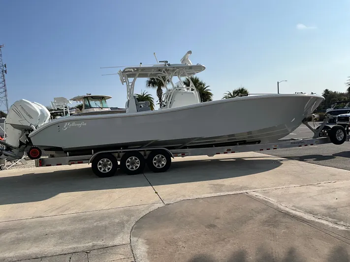  Yacht Photos Pics 2020 Yellowfin 36 Offshore boat on trailer, side view.