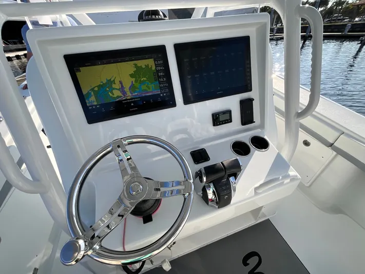  Yacht Photos Pics 2020 Yellowfin 36 Offshore boat helm with navigation system.