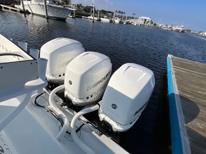  Yacht Photos Pics 2020 Yellowfin 36 Offshore with three Mercury engines at the dock.