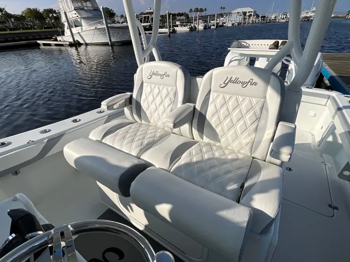  Yacht Photos Pics 2020 Yellowfin 36 Offshore boat with luxurious seating at the marina.
