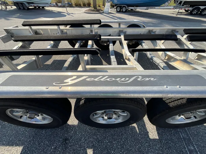  Yacht Photos Pics Yellowfin 36 Offshore 2020 boat trailer with three wheels.