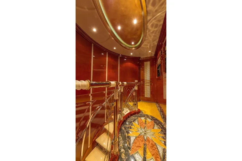 I Love This Boat Yacht Photos Pics Luxurious interior of 2002 Christensen Tri Deck yacht with elegant staircase and intricate flooring design.
