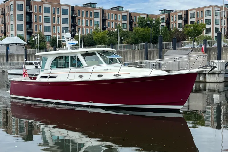 Rolling Stone Yacht Photos Pics 2017 Back Cove 41 boat docked in urban marina setting.
