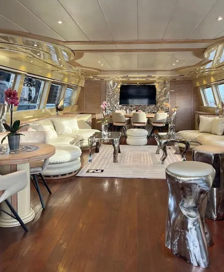  Yacht Photos Pics Luxurious interior of 1995 Mondomarine Custom yacht with elegant seating and modern decor.