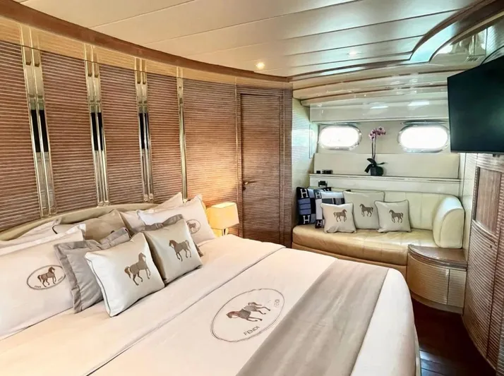  Yacht Photos Pics Luxurious Mondomarine Custom yacht bedroom, 1995 model, featuring elegant decor and plush bedding.