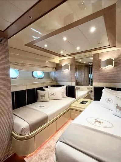  Yacht Photos Pics Luxurious Mondomarine Custom yacht bedroom, 1995 model, featuring elegant twin beds and modern lighting.