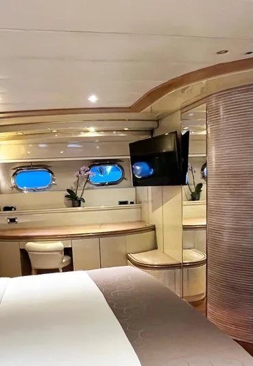  Yacht Photos Pics Luxurious Mondomarine Custom yacht interior, 1995 model, featuring elegant furnishings and porthole windows.