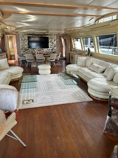  Yacht Photos Pics Luxurious Mondomarine Custom yacht interior, 1995 model, featuring elegant seating and modern decor.