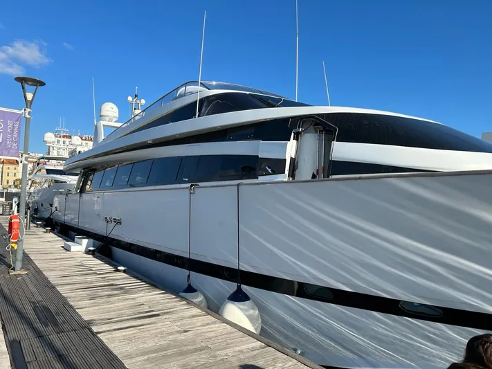  Yacht Photos Pics Luxury 1995 Mondomarine Custom yacht docked under clear blue sky.