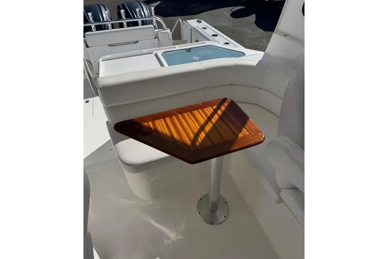  Yacht Photos Pics Interior of 2024 NorthCoast 285 HT with wooden table.