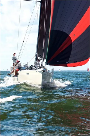 **4806tw Yacht Photos Pics 2017 Dehler 42c sailboat navigating ocean waters with vibrant sails.