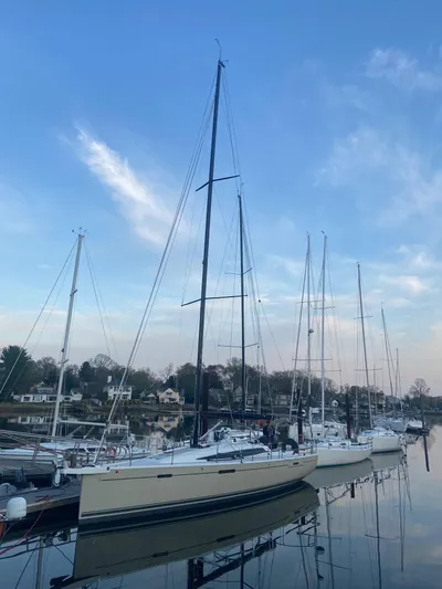 **4806tw Yacht Photos Pics 2017 Dehler 42c sailboat docked in a serene marina setting.