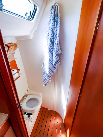 **4806tw Yacht Photos Pics 2017 Dehler 42c yacht bathroom with wooden flooring and a hanging towel.