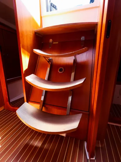 **4806tw Yacht Photos Pics Wooden interior stairs of a 2017 Dehler 42c yacht, featuring curved steps.
