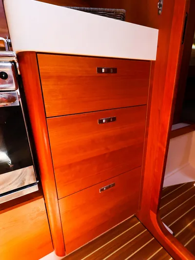 **4806tw Yacht Photos Pics Wooden cabinetry inside 2017 Dehler 42c yacht, featuring sleek drawers and modern design.