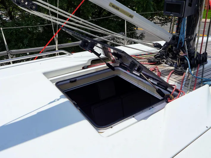 **4806tw Yacht Photos Pics Open hatch on 2017 Dehler 42c sailboat deck with rigging and ropes.