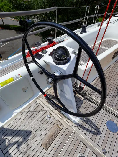 **4806tw Yacht Photos Pics Steering wheel of 2017 Dehler 42c yacht with compass and deck view.