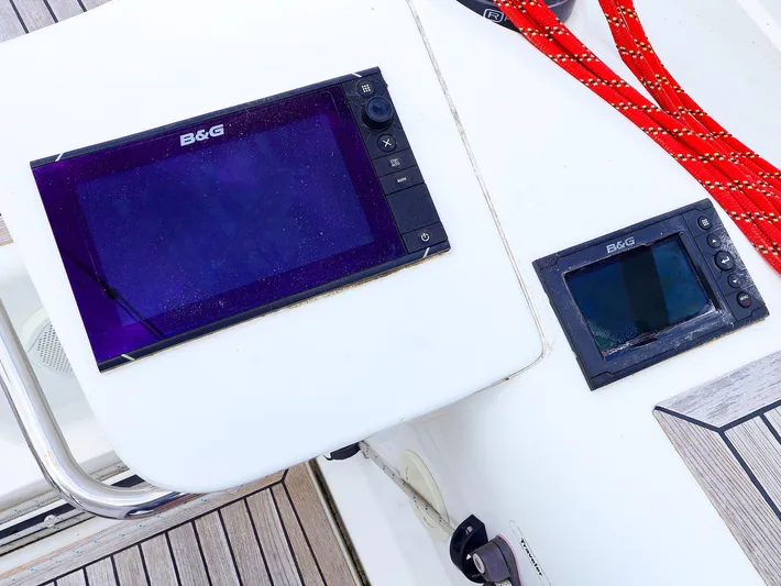 **4806tw Yacht Photos Pics B&G navigation equipment on a 2017 Dehler 42c yacht, featuring red ropes and wooden deck.