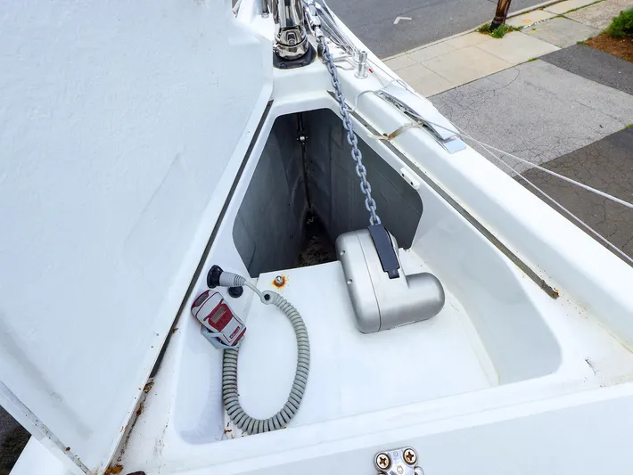 **4806tw Yacht Photos Pics Anchor locker of a 2017 Dehler 42c sailboat with chain and winch.