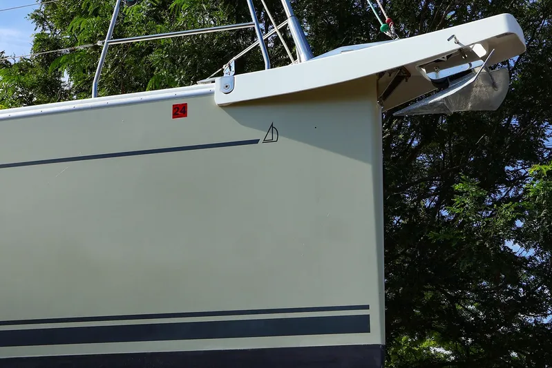 **4806tw Yacht Photos Pics 2017 Dehler 42c yacht stern with anchor, surrounded by trees.