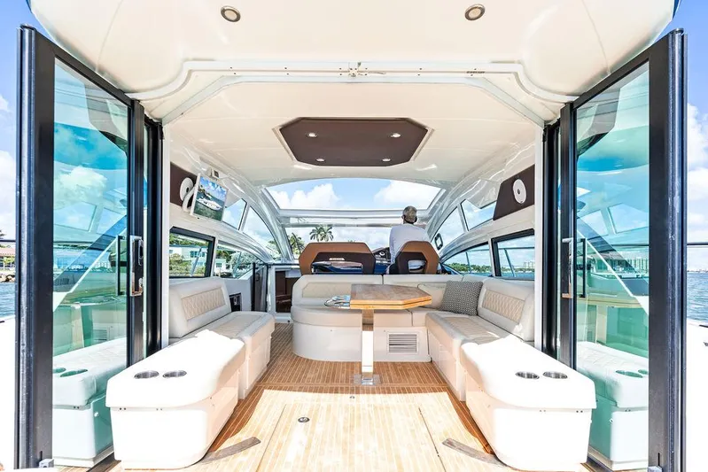 Two Segals Yacht Photos Pics 2019 Beneteau Gran Turismo 46 yacht interior with spacious seating and elegant design.