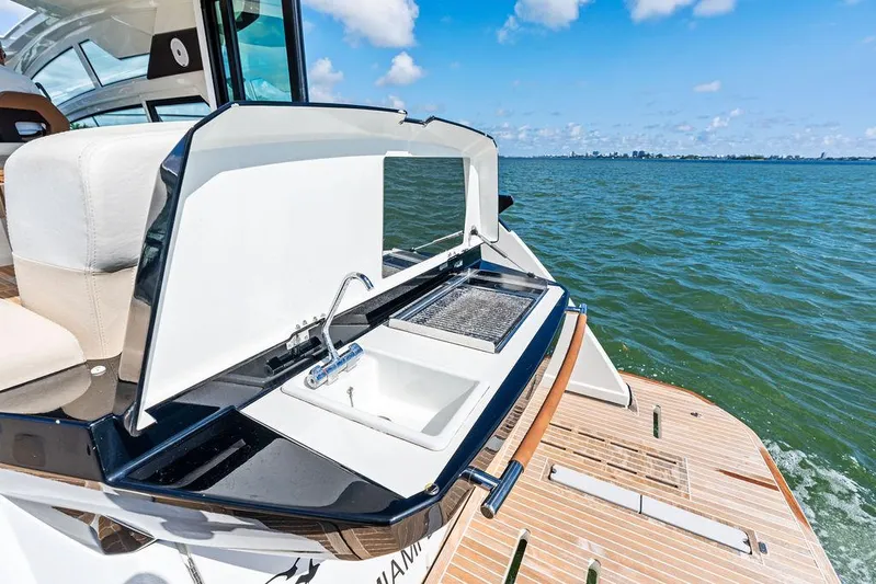 Two Segals Yacht Photos Pics 2019 Beneteau Gran Turismo 46 yacht with outdoor sink and grill on deck.