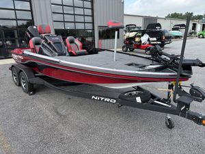 2025 Nitro Z19 Pro boat on trailer, parked outside dealership.