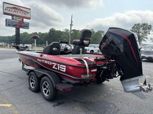 2025 Nitro Z19 Pro boat with powerful outboard motor, parked on a trailer.