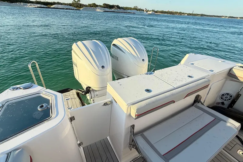  Yacht Photos Pics Solara S-310 CW 2025 boat with dual engines on a sunny day.