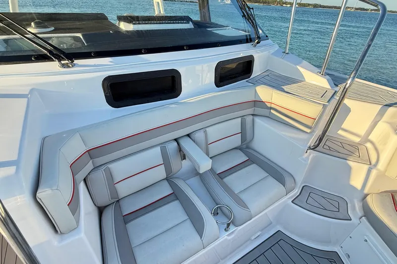  Yacht Photos Pics Luxurious seating area on 2025 Solara S-310 CW boat, featuring modern design and waterfront view.