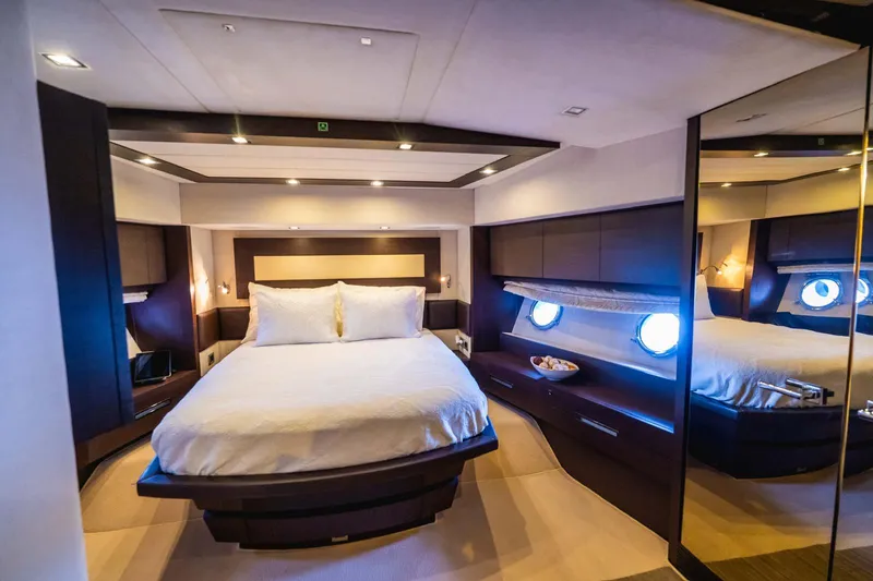  Yacht Photos Pics Luxurious bedroom interior of 2010 Azimut 86S yacht with modern design and ambient lighting.