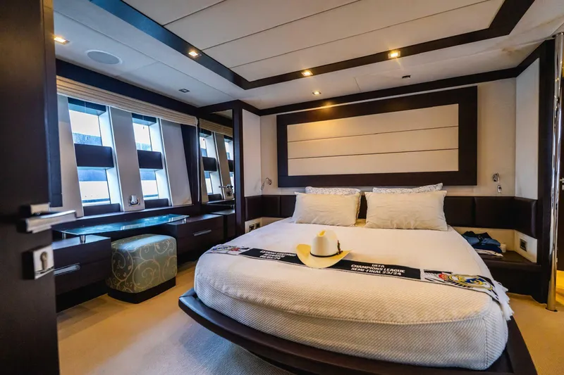  Yacht Photos Pics Luxurious bedroom interior of 2010 Azimut 86S yacht with modern decor and large windows.