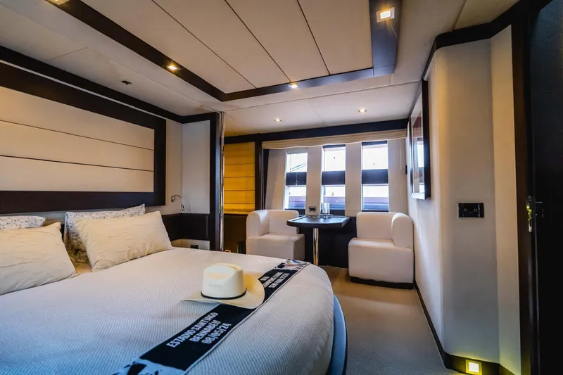 Yacht Photos Pics Luxurious bedroom interior of 2010 Azimut 86S yacht with modern furnishings and elegant decor.