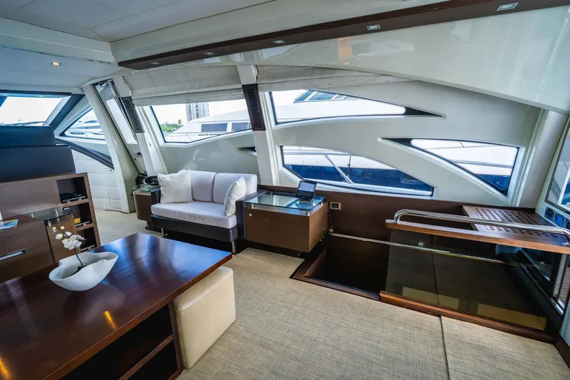  Yacht Photos Pics Luxurious interior of 2010 Azimut 86S yacht with modern furnishings and large windows.