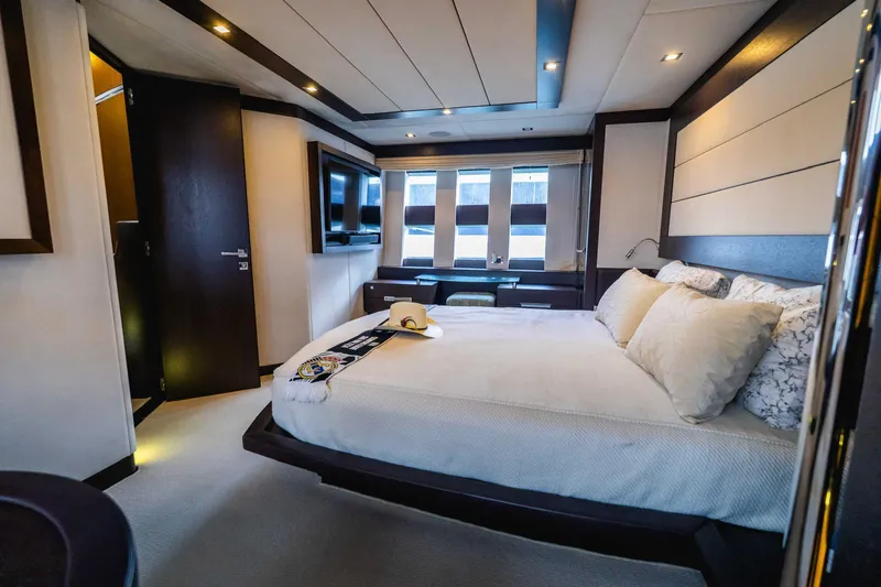  Yacht Photos Pics Luxurious bedroom interior of 2010 Azimut 86S yacht with modern design and elegant furnishings.