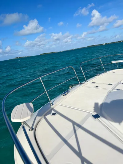 Gr8 Day Yacht Photos Pics Aquila 44 Yacht 2018 cruising on clear blue waters under a sunny sky.