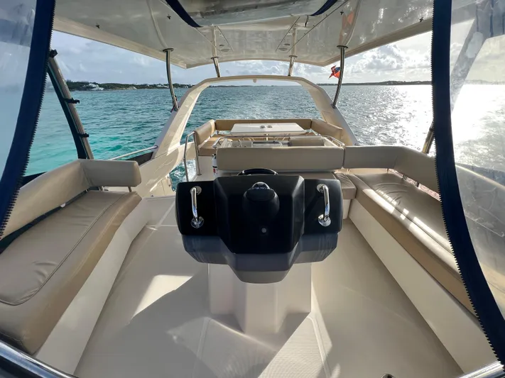Gr8 Day Yacht Photos Pics 2018 Aquila 44 Yacht interior with helm, seating, and ocean view.