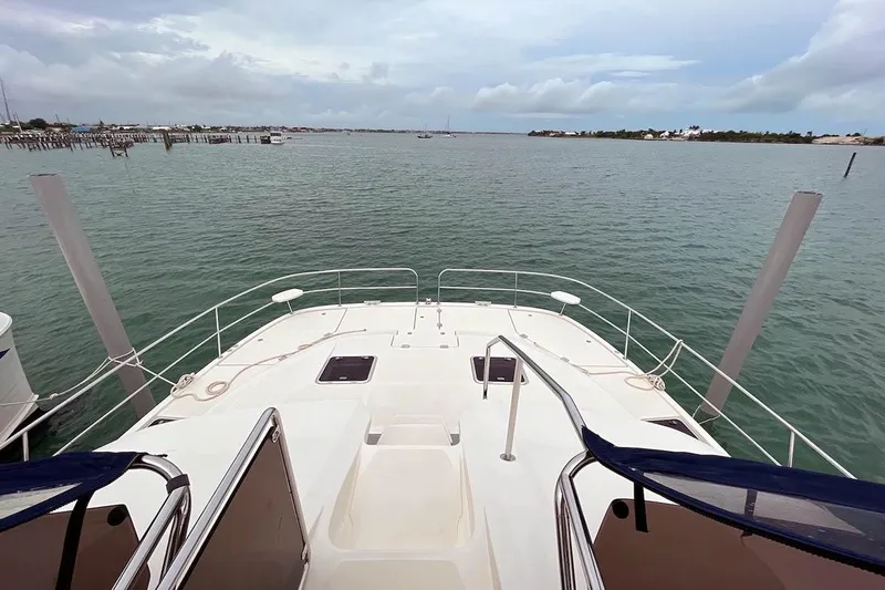 Gr8 Day Yacht Photos Pics Aquila 44 Yacht 2018 on calm waters with scenic horizon view.