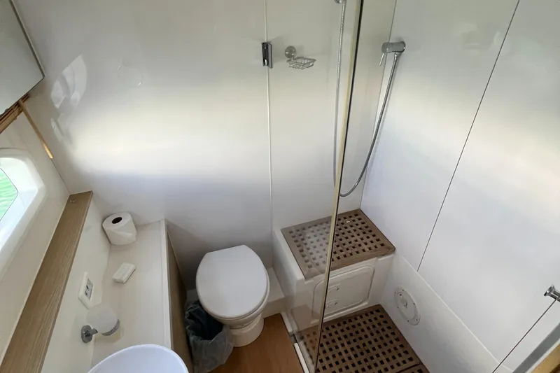 Gr8 Day Yacht Photos Pics Bathroom interior of 2018 Aquila 44 Yacht with shower and toilet.