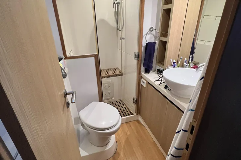 Gr8 Day Yacht Photos Pics Bathroom interior of 2018 Aquila 44 Yacht with shower and sink.