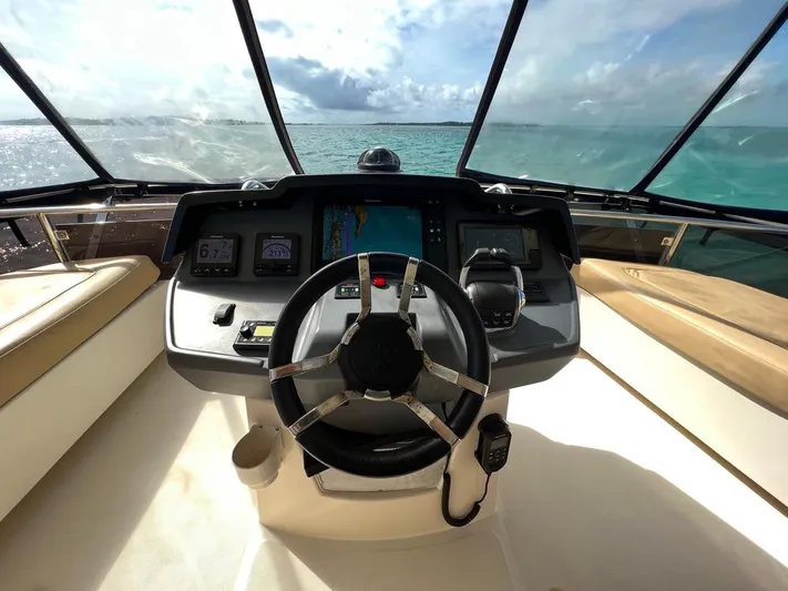 Gr8 Day Yacht Photos Pics Aquila 44 Yacht 2018 helm with ocean view, featuring modern navigation equipment.